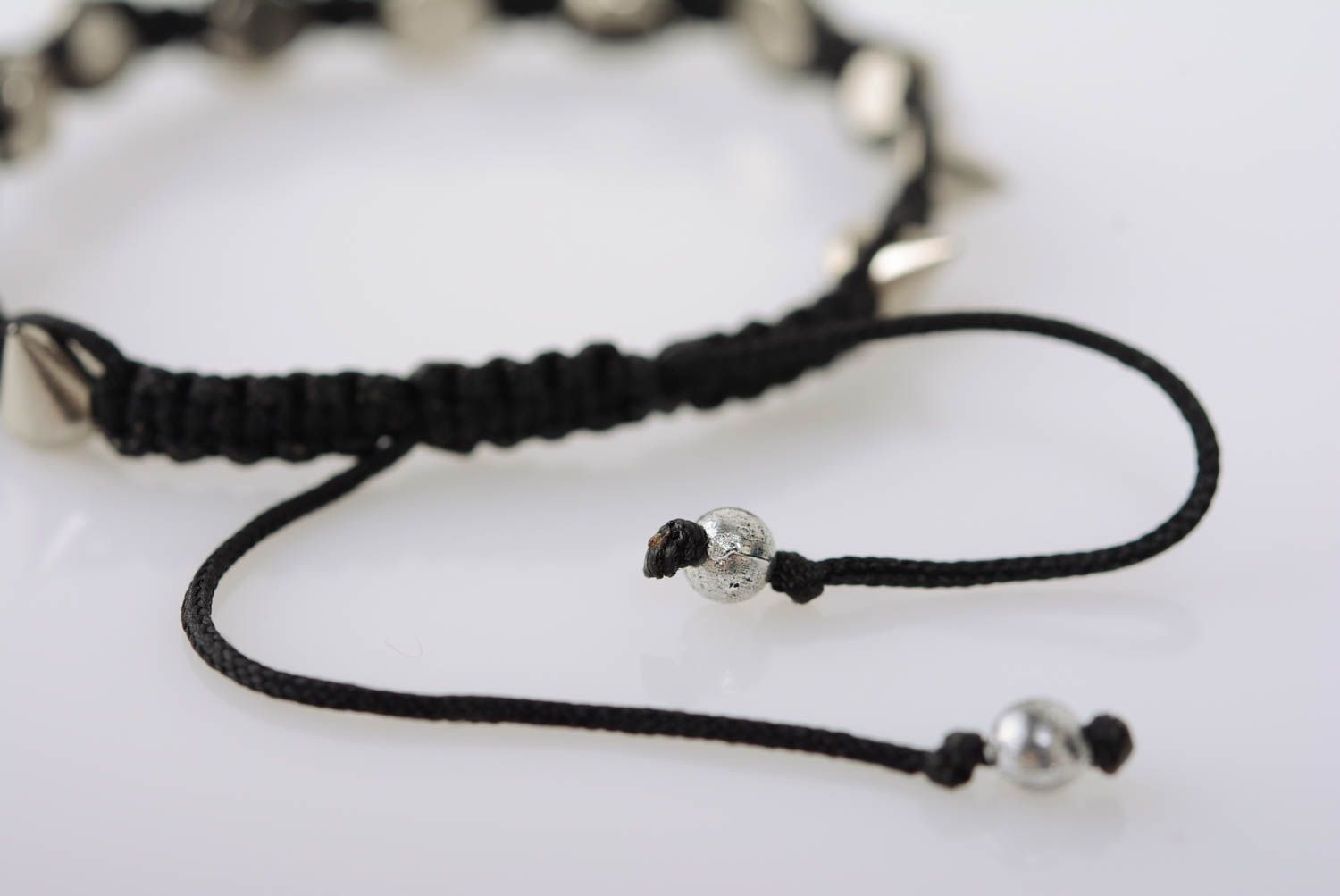 Beautiful black handmade thin macrame woven cord bracelet with metal studs photo 5