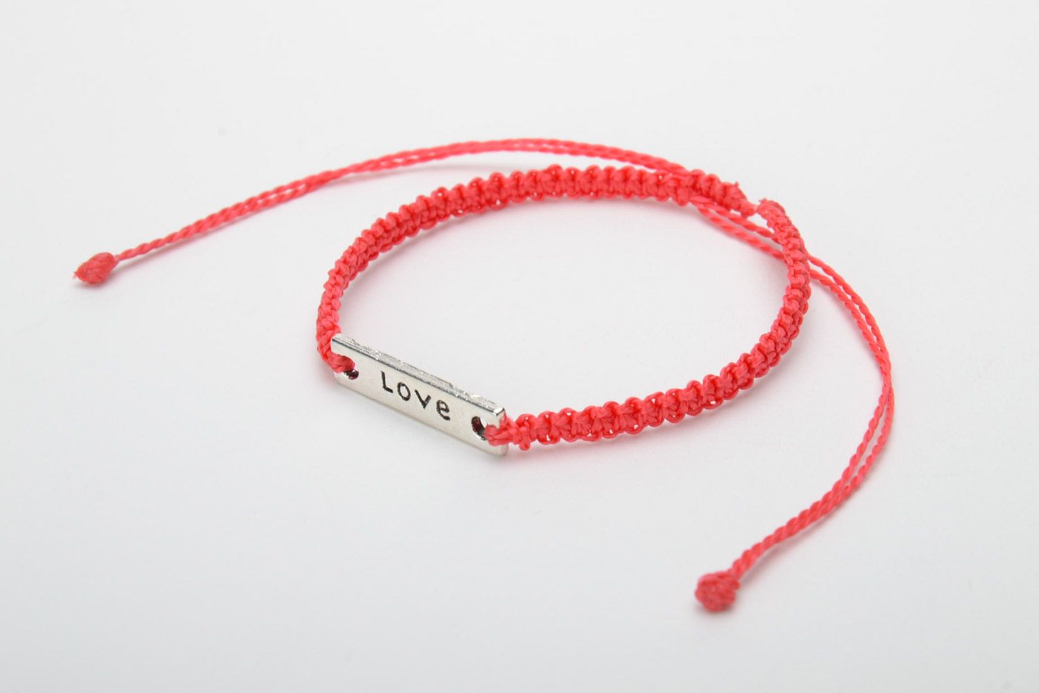 Handmade women's macrame woven bracelet of red color with metal lettering Love photo 3