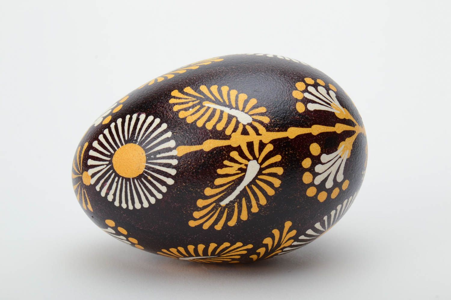 Handmade Lemkiv decorative Easter egg with bright flowers on black background photo 3