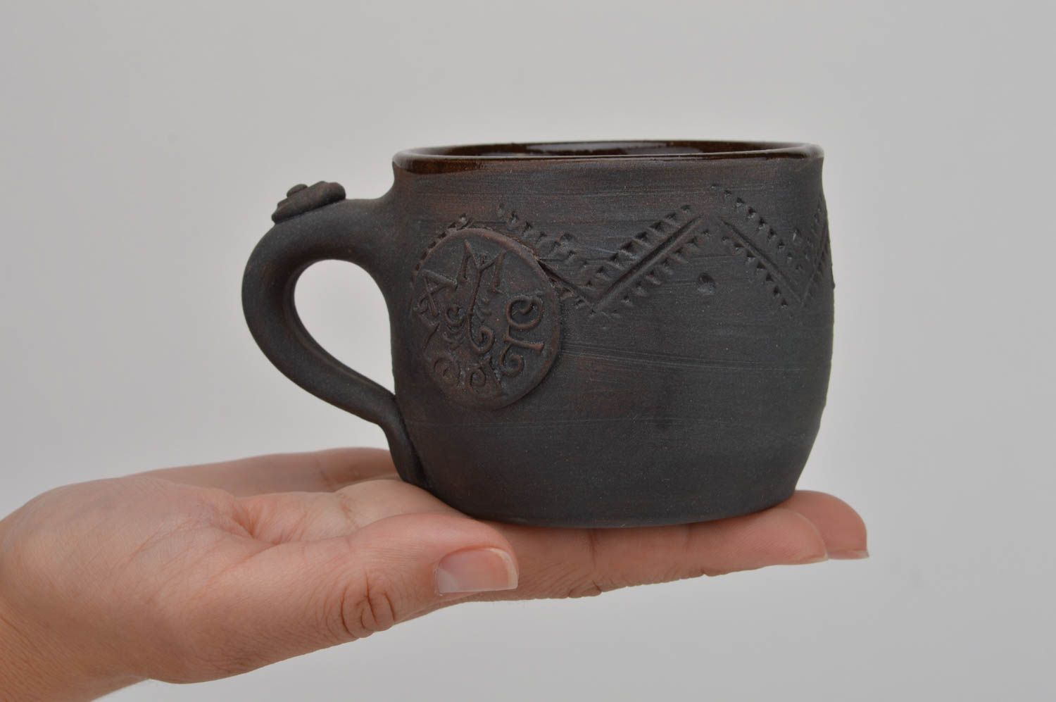Ceramic unuusal beautiful dark designer handmade cup for tea with button photo 3