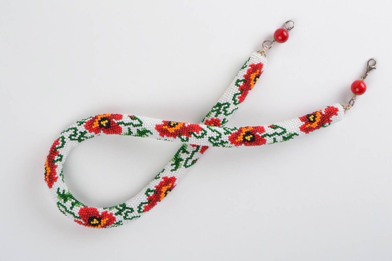 Белое ожерелье из бисера с цветами ручной работы в виде жгута оригинальное фото 2