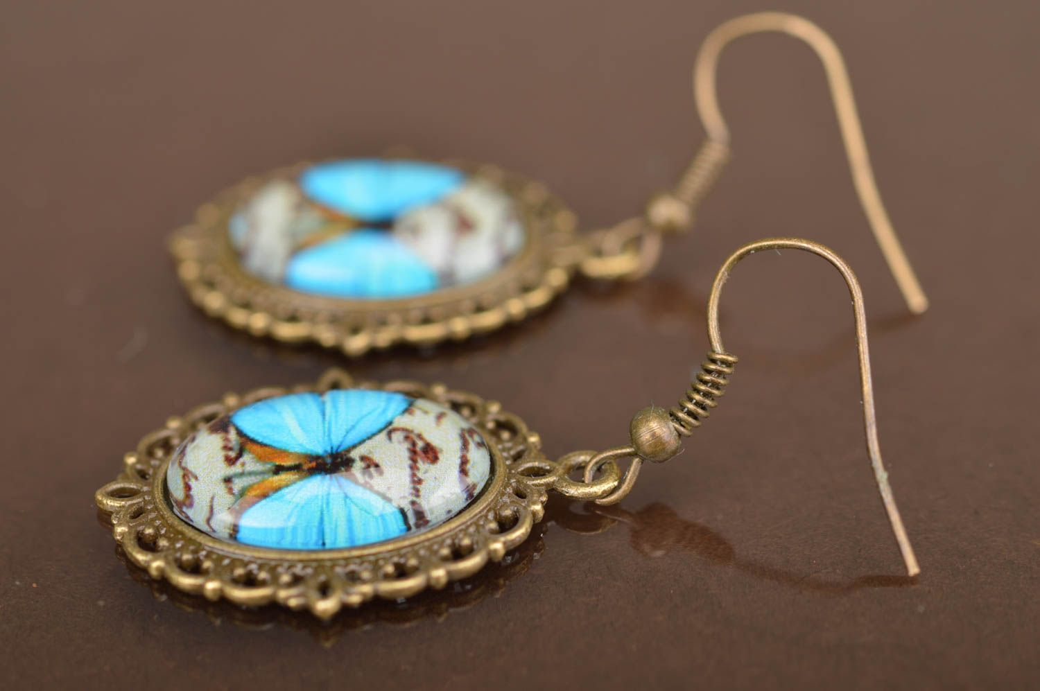 Beautiful stylish vintage handmade oval metal earrings with butterflies image photo 5