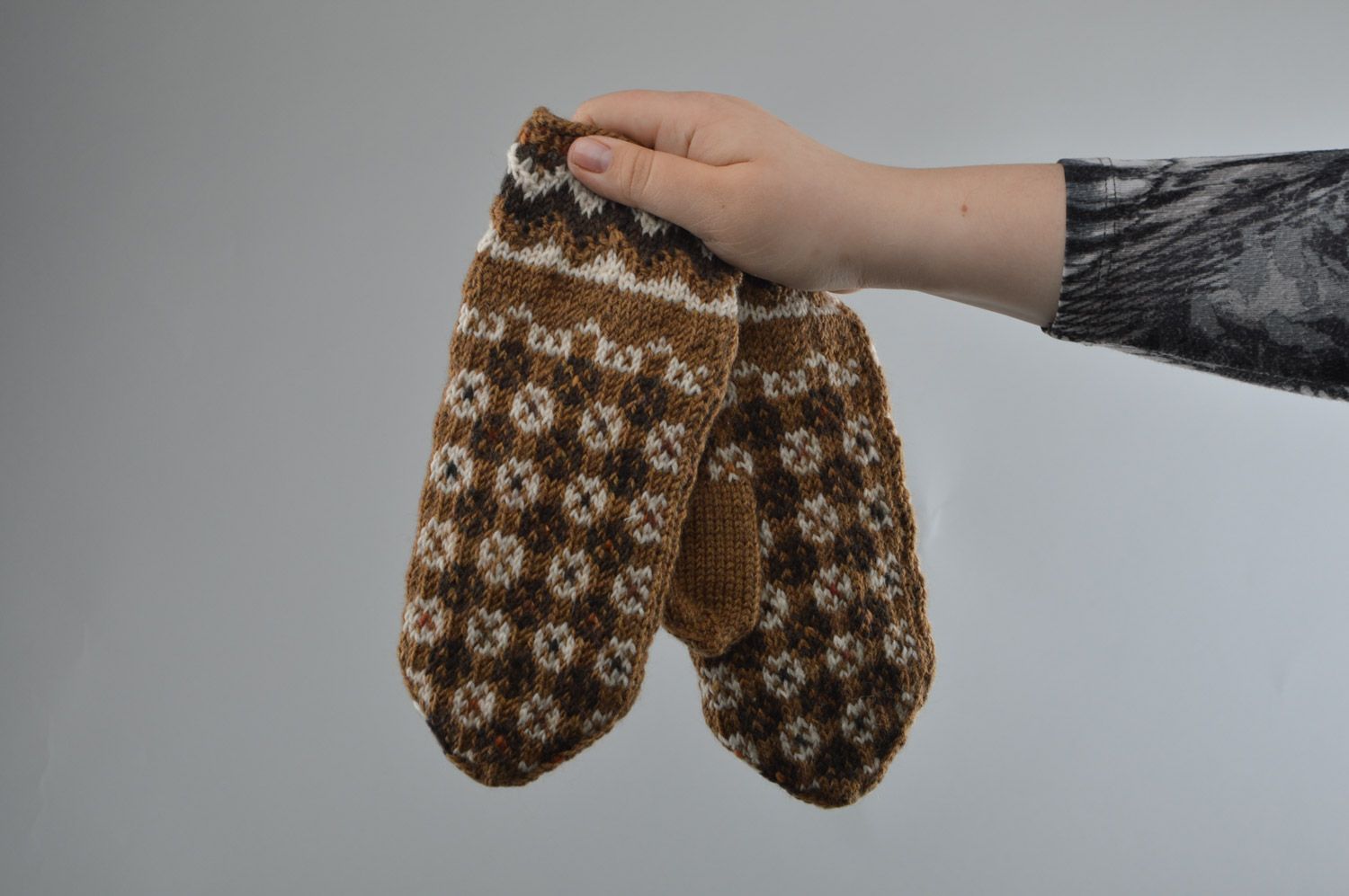 Handmade warm winter women's brown mittens knitted of wool with ornament photo 3