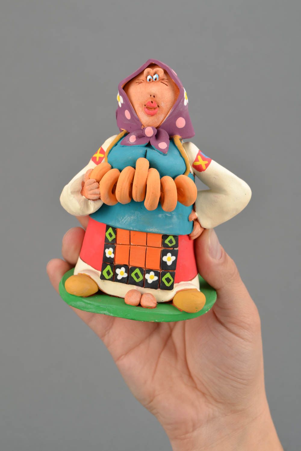 Clay statuette Woman with Donuts photo 2