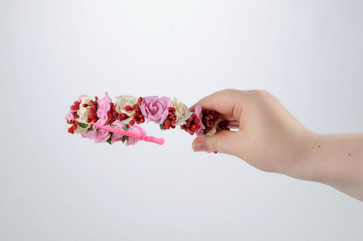 Headband with pink artificial flowers photo 5