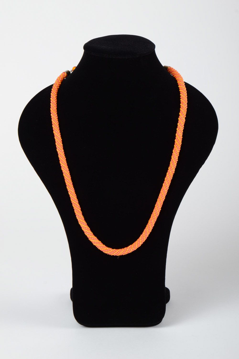 Beautiful stylish handmade women's long beaded necklace of orange color photo 1