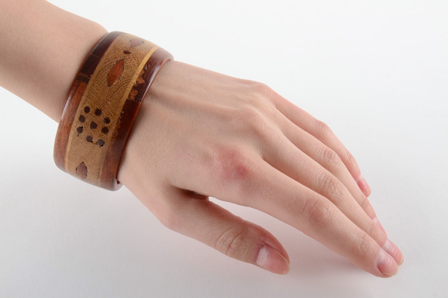 Handmade wrist bracelet carved of wood with inlay tinted and coated with varnish photo 6