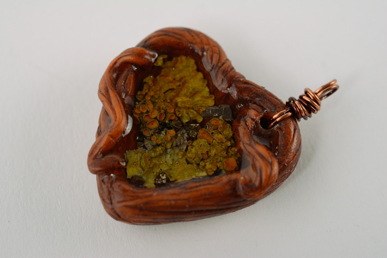 Beautiful homemade neck pendant with moss inside coated with epoxy Heart photo 1