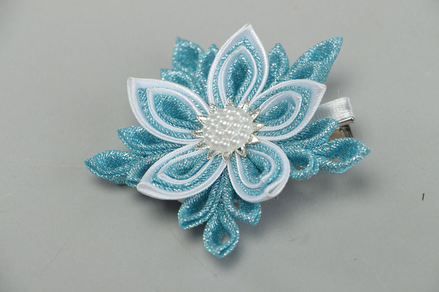 Handmade hair clip with kanzashi flower made of gold cloth and satin in blue color photo 1