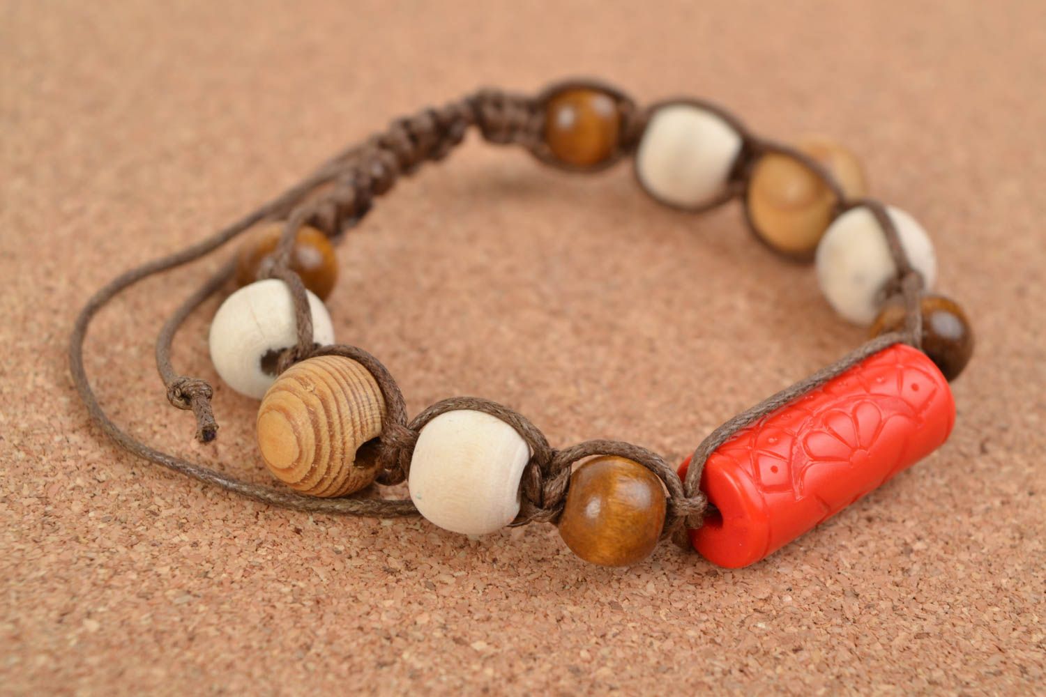 Handmade stylish bracelet with large wooden beads woven of cord red and brown photo 2