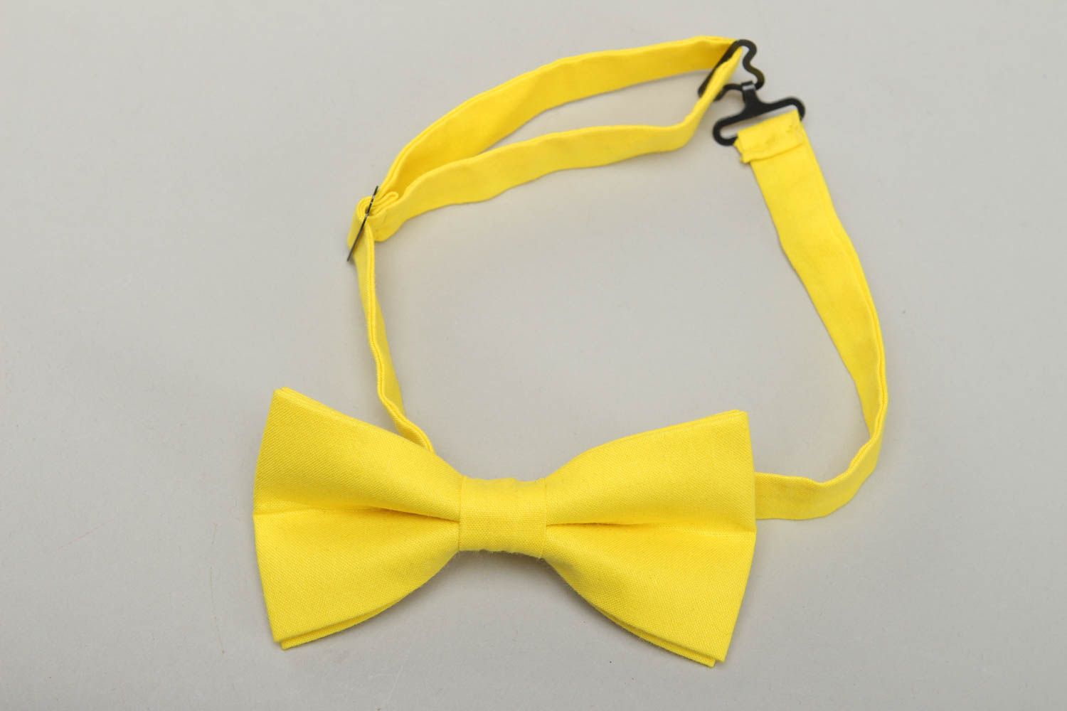Bright yellow fabric bow tie photo 1