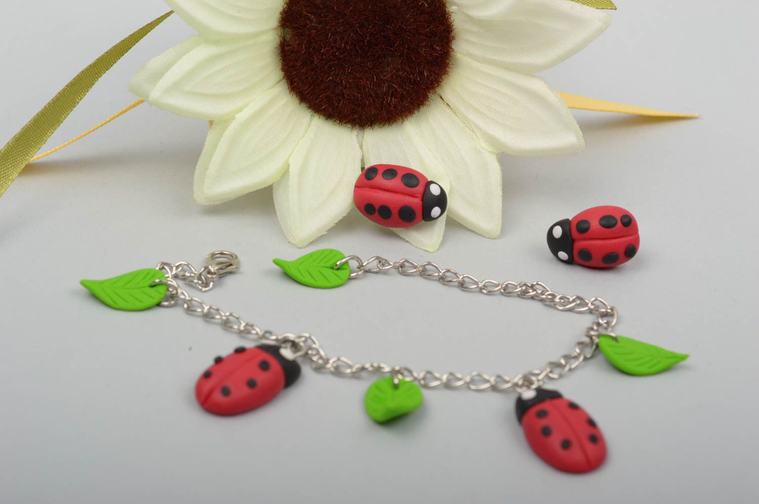 Ladybug stud earrings and chain charm bracelet for a girl photo 1