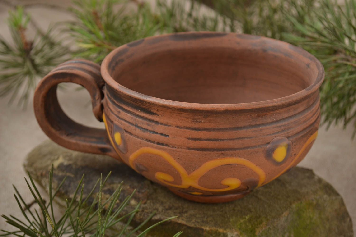Clay teacup with handle in brown color with yellow pattern 0,36 lb photo 1