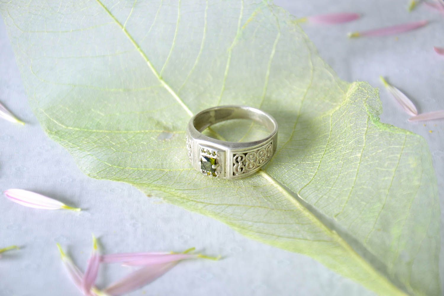 Silver ring with a natural stone photo 1
