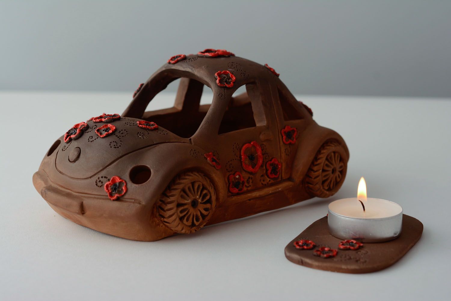 Ceramic candle lamp in the shape of car photo 1