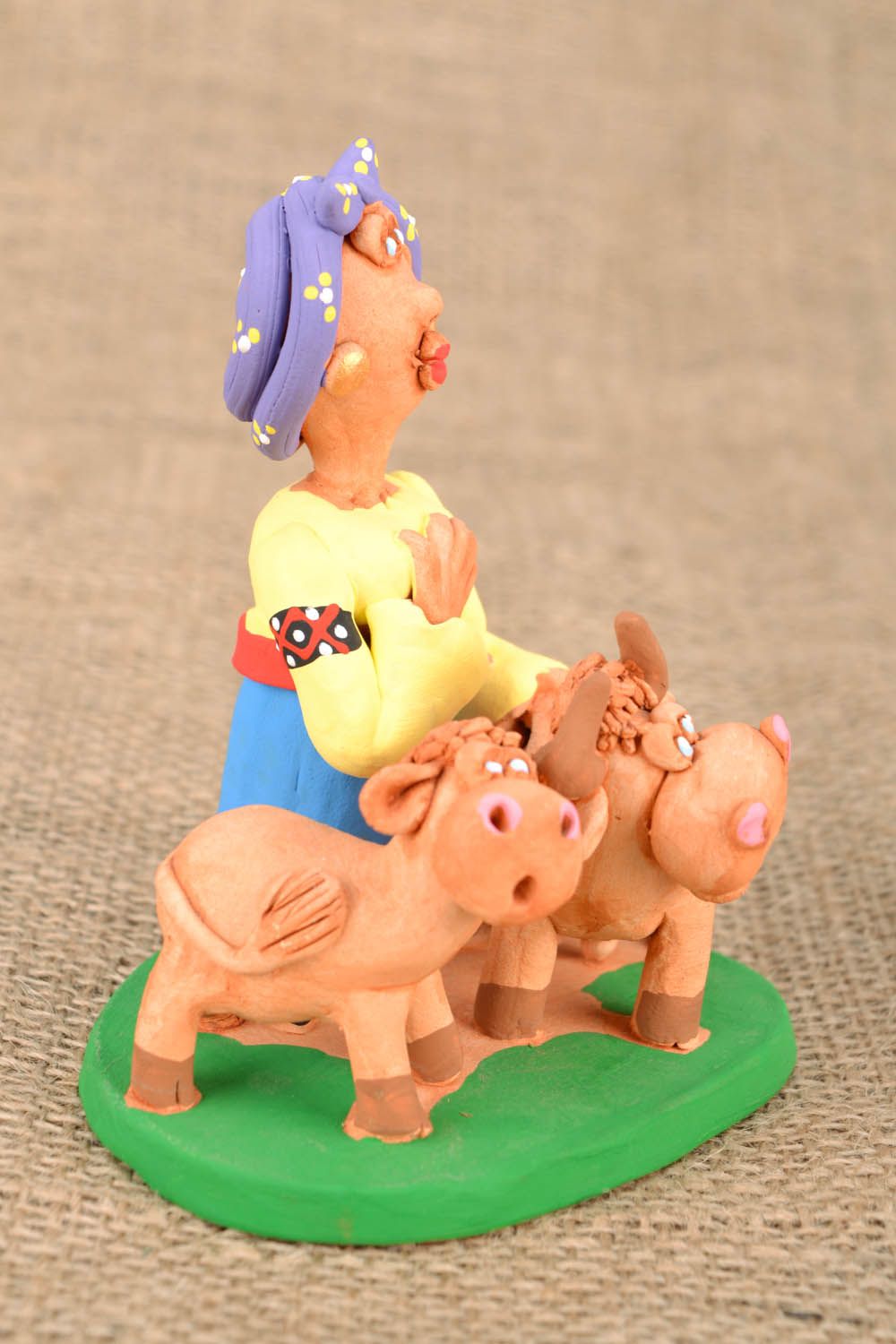 Estatueta Mulher cossaco com vacas foto 1