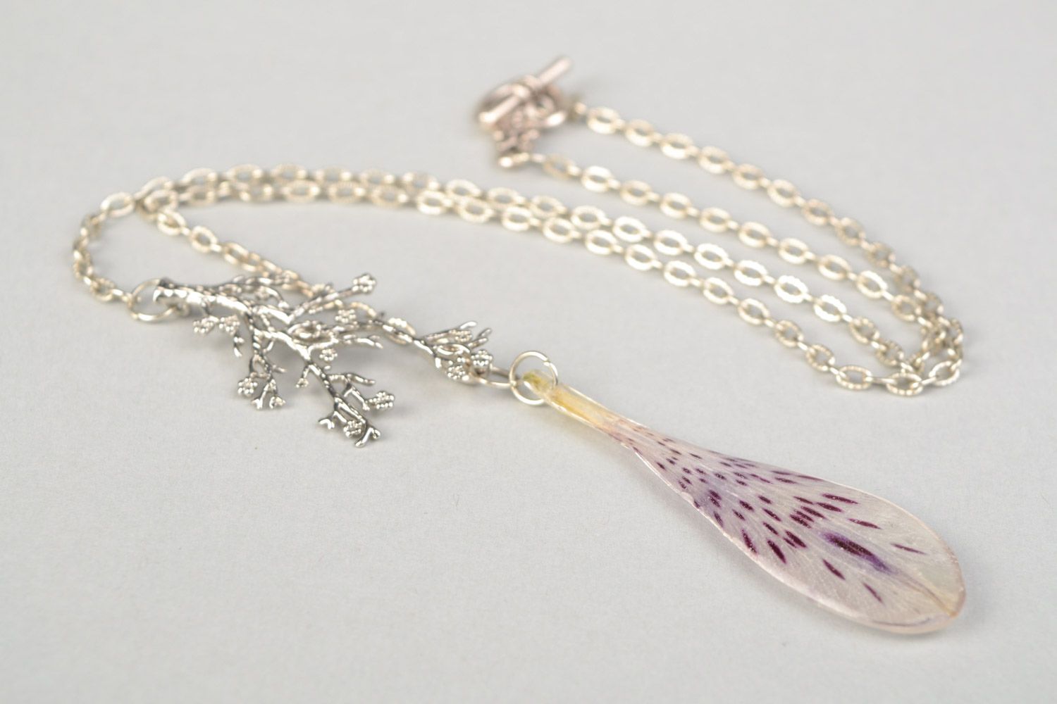 Elegant handmade pendant with alstroemeria petal in epoxy resin on metal chain photo 5
