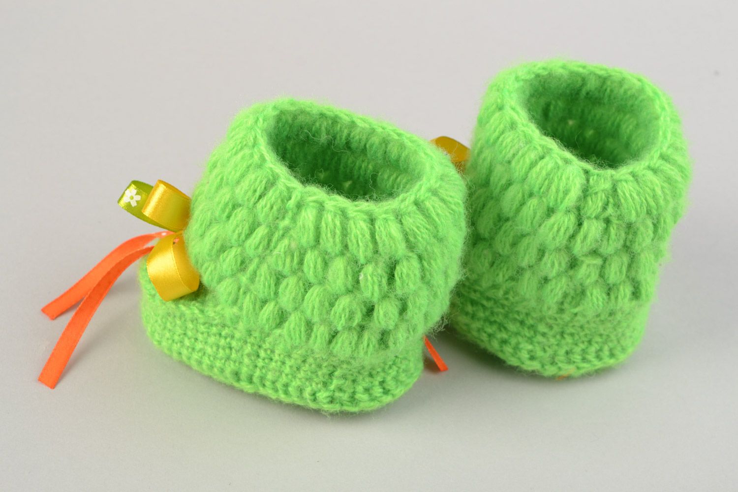 Light green hand-crocheted beautiful baby booties made of angora threads with bows photo 5
