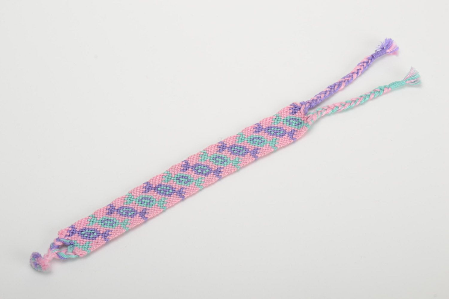 Handmade friendship wrist bracelet woven of pink and violet threads Candies photo 2