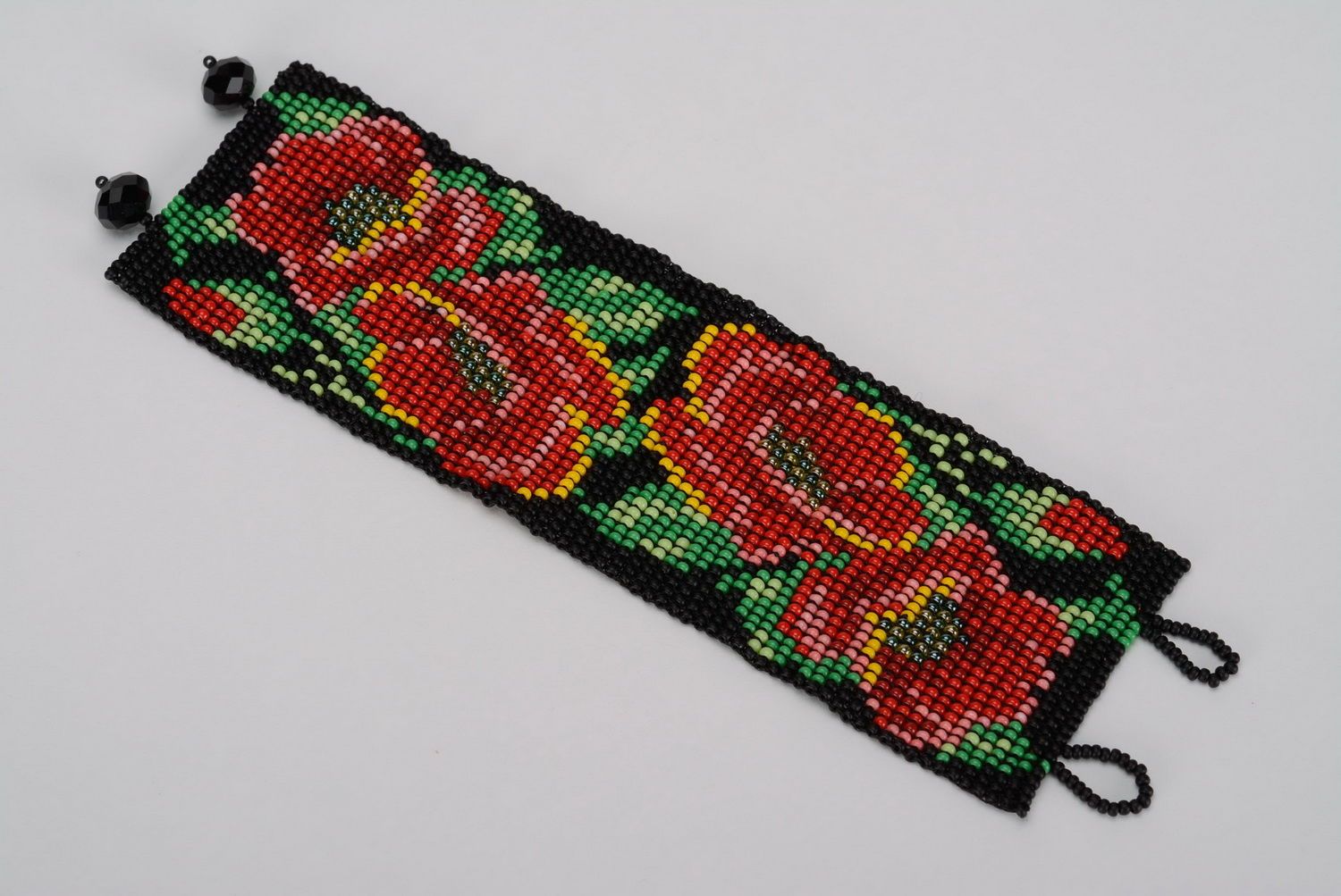 Bracelet with red flowers photo 1