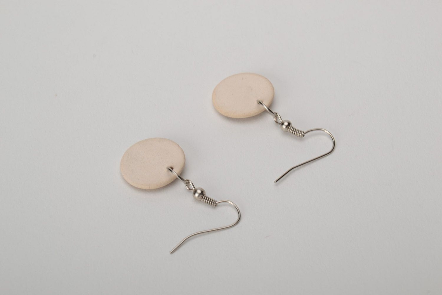 Handmade beige painted ceramic round earrings with charms for women photo 4