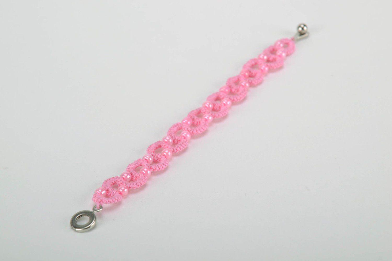 Bracelet braided from thread pink photo 3