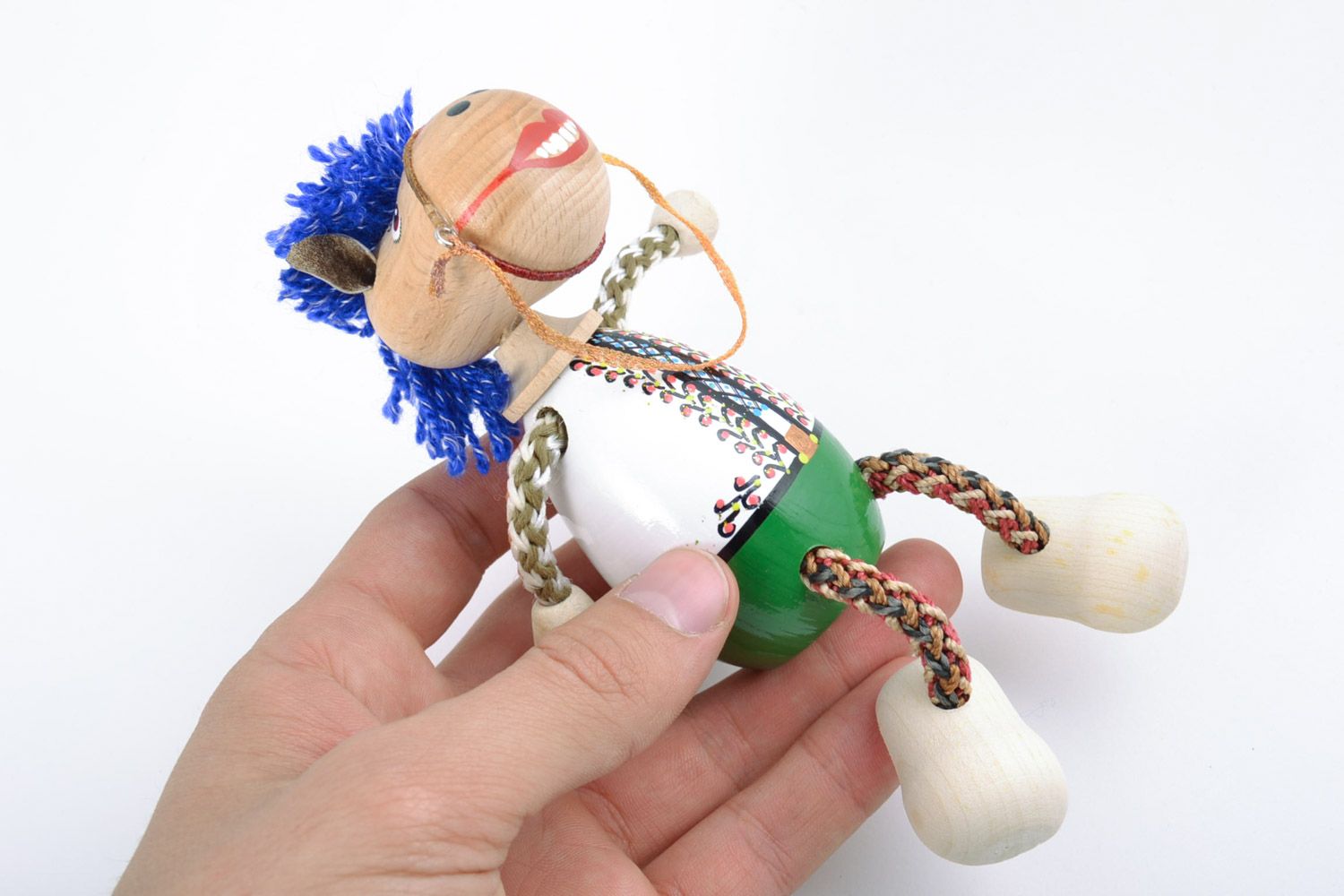 Originelles Öko handmade Spielzeug Pferd aus Holz mit blauer Mähne foto 2
