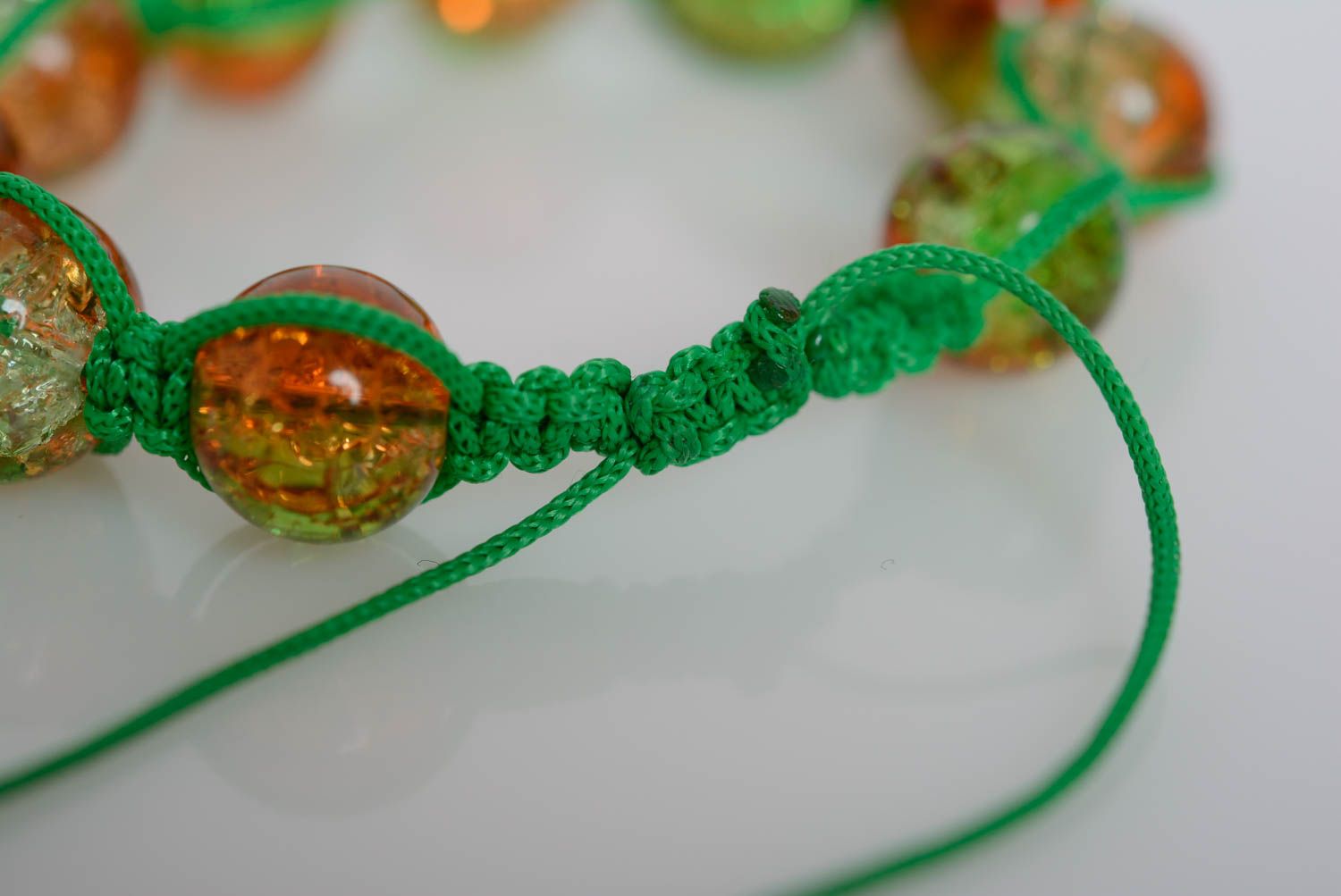 Handmade bracelet made of plastic beads on waxed cord braided green accessory photo 4