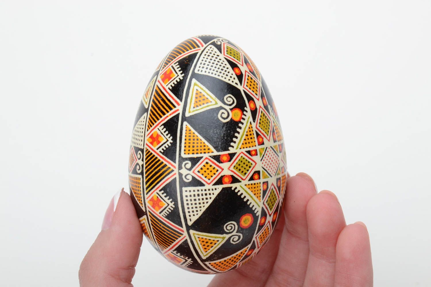 Handmade decorative dark painted goose egg with geometric ornament Easter souvenir photo 5