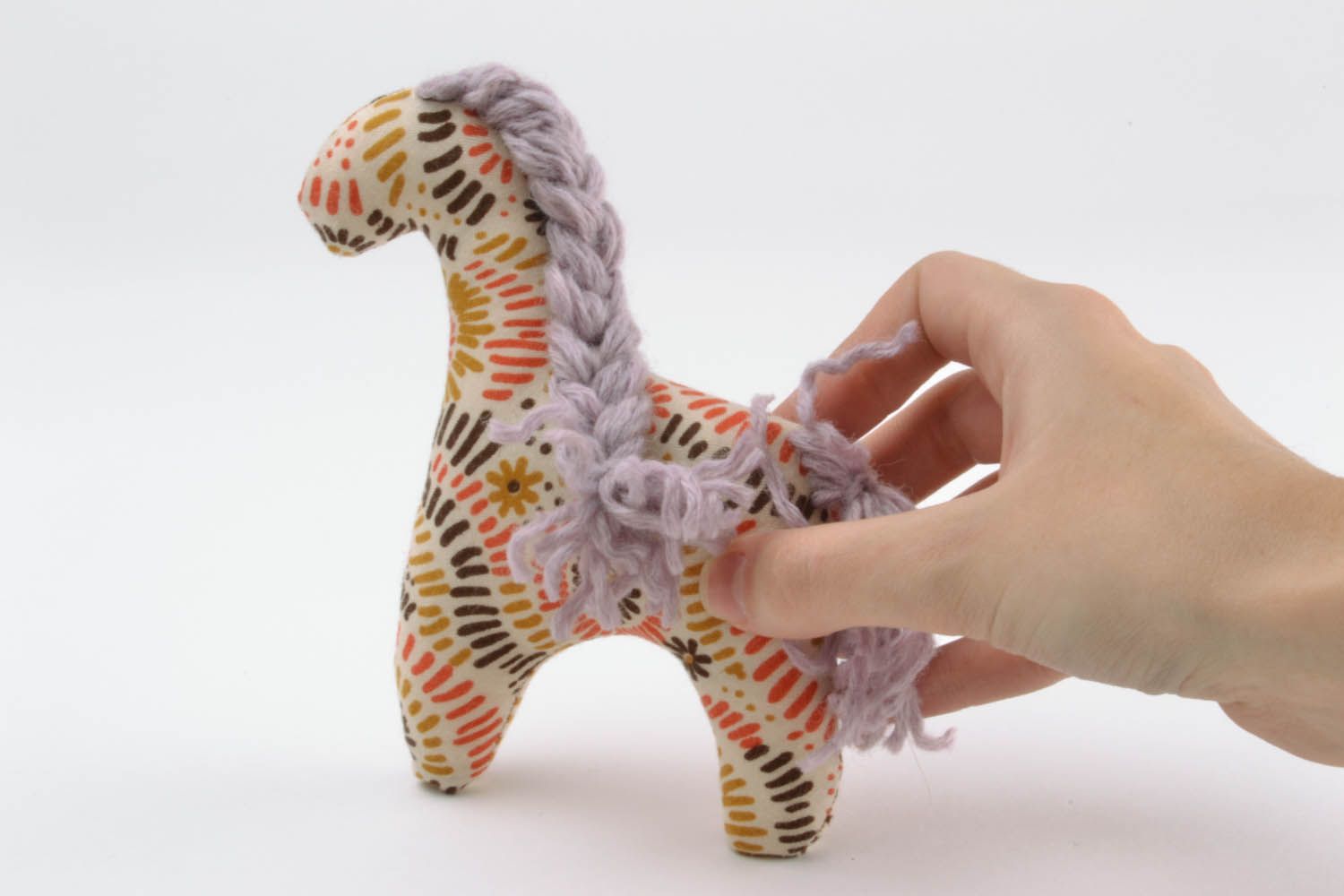 Brinquedo artesanal de tecidos naturais Cavalo foto 2