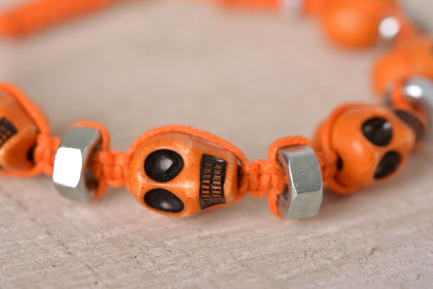 Handmade orange skull beaded orange cord bracelet with female screws photo 2