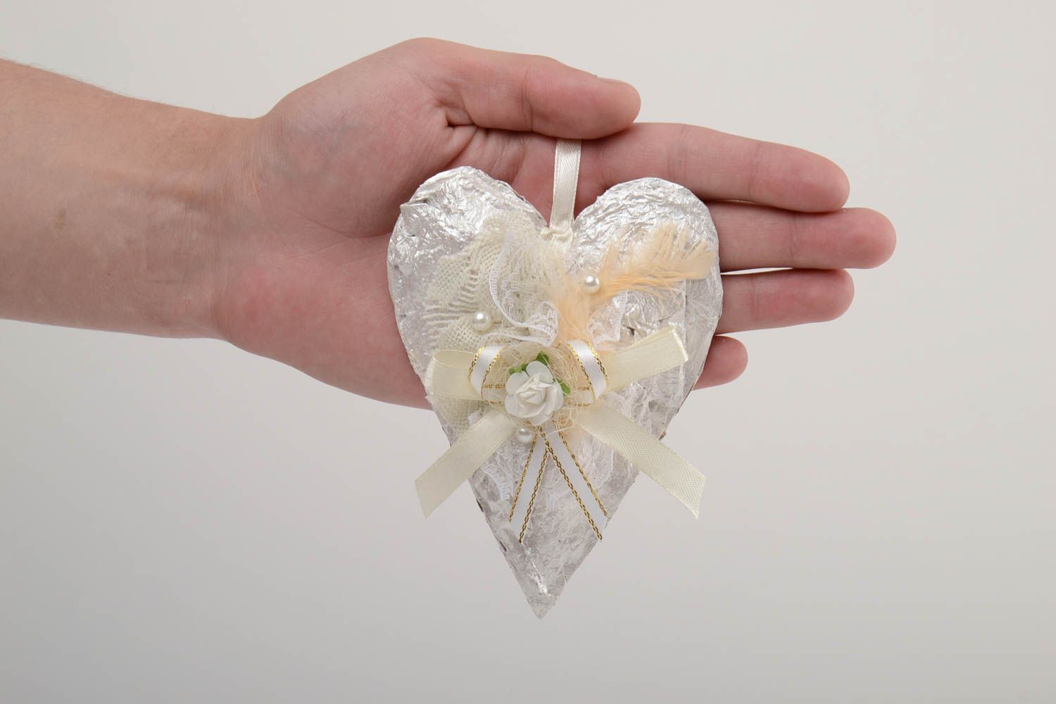 Handmade white heart-shaped carton wall hanging decorated with ribbons  photo 5