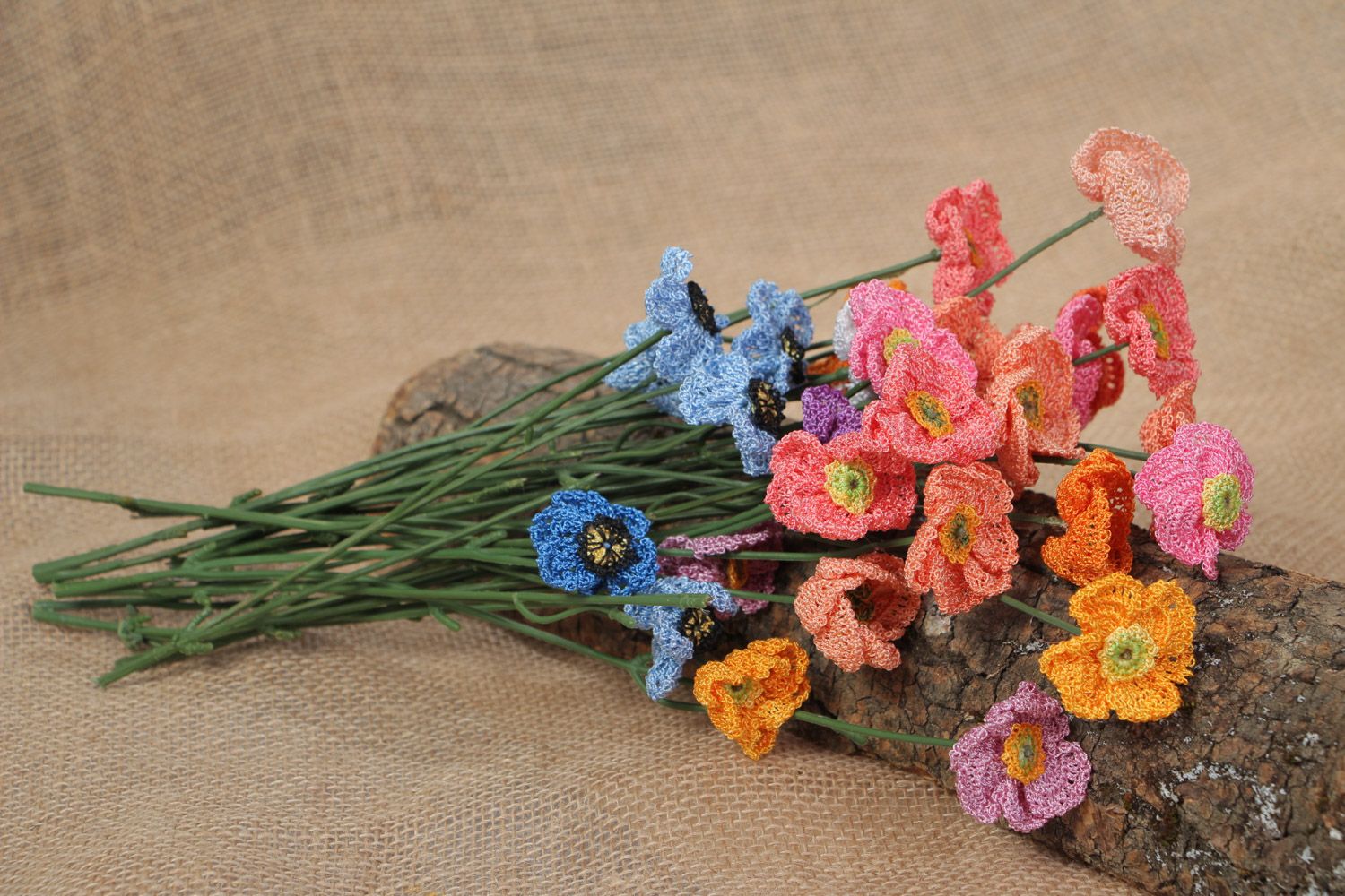 Bouquet of bright colorful decorative flowers crocheted of cotton threads photo 1