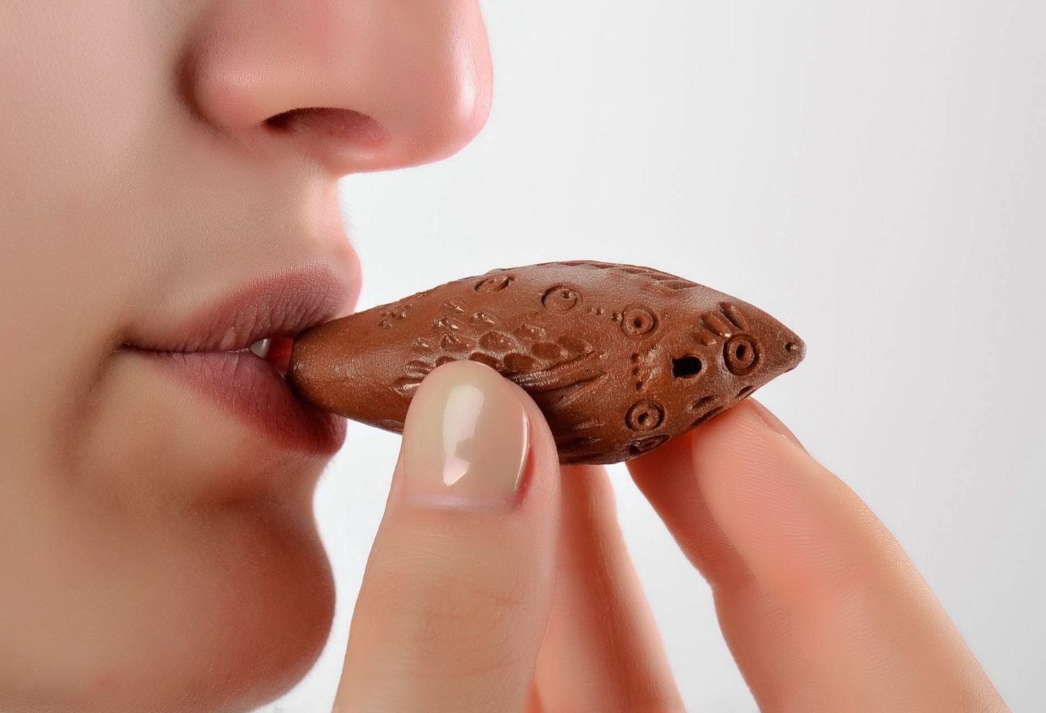 Clay penny whistle Fish photo 1