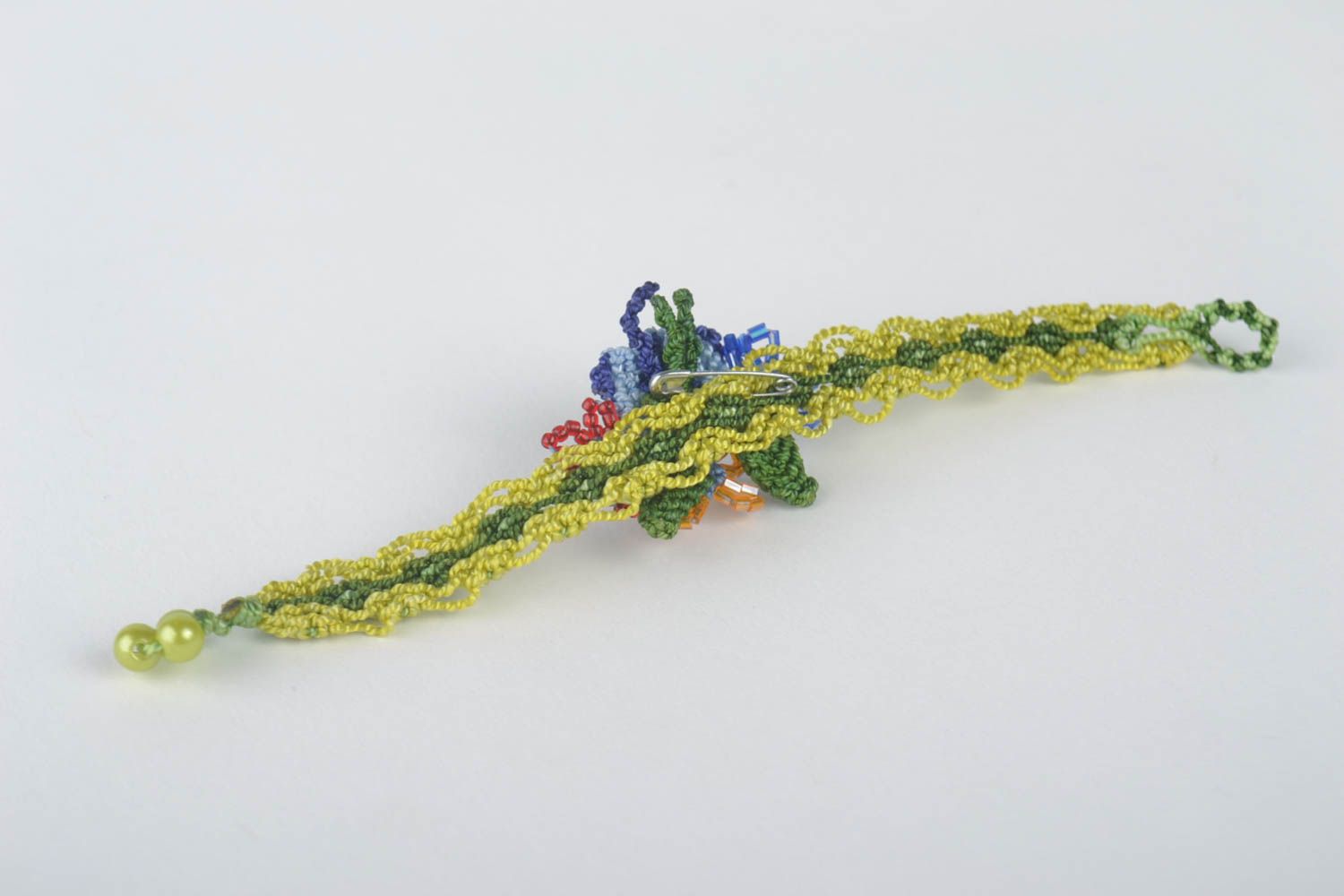 Украшения ручной работы браслет на руку плетеная брошь с цветами красивая фото 4