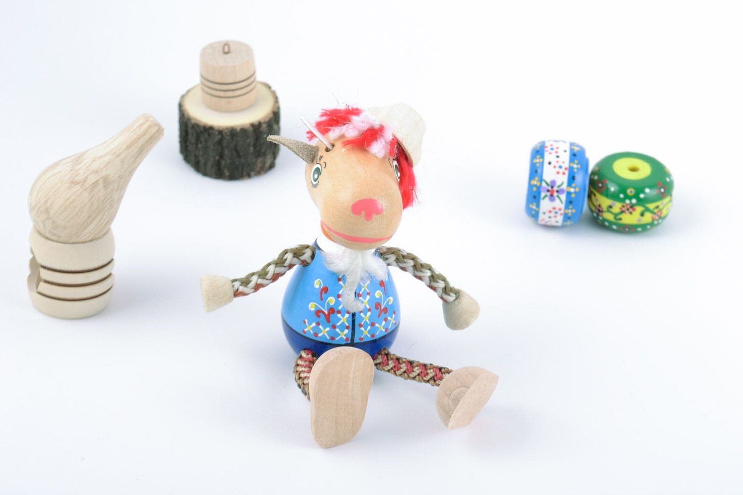 Авторская деревянная эко игрушка из бука с ручной росписью красками Козлик фото 1