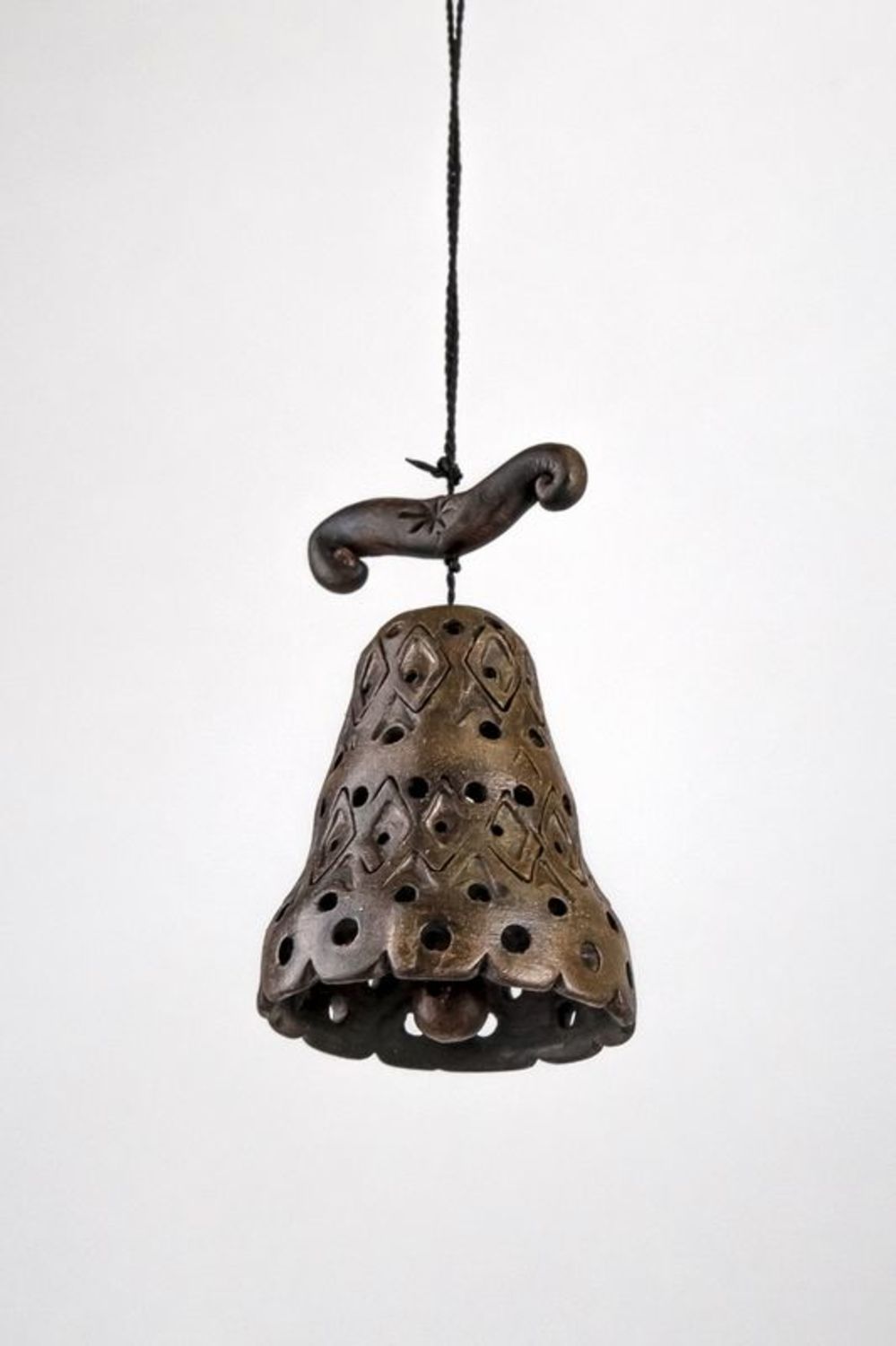 Ceramic bell on a rope photo 1