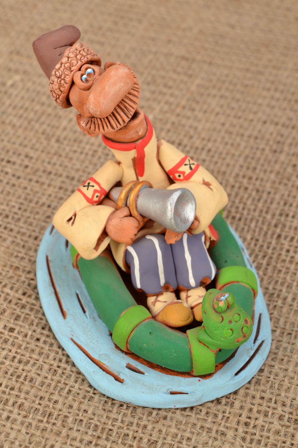 Homemade clay figurine Hunter in the Boat photo 1