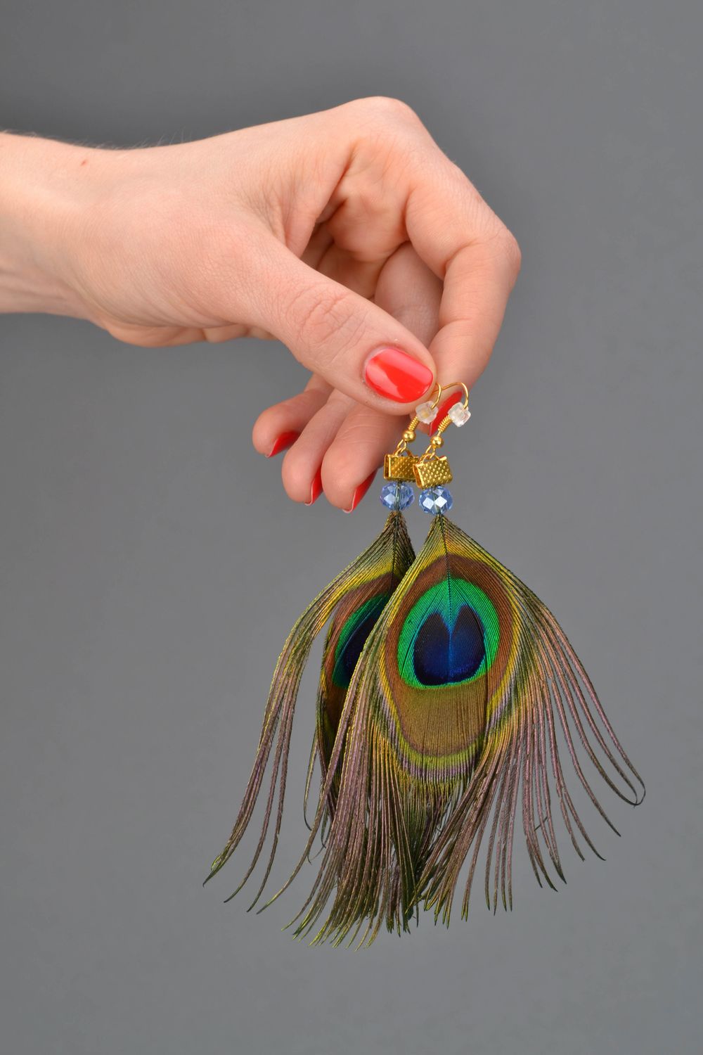 Pendientes hechos a mano de plumas de pavo real foto 2