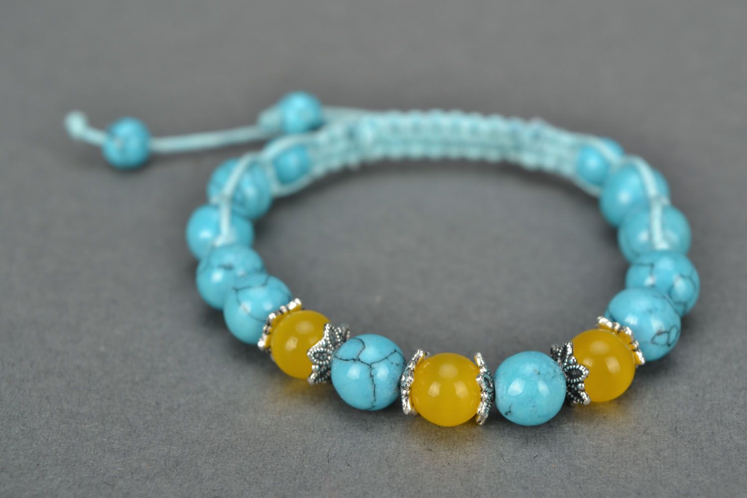 Handmade bracelet with turquoise and cat's eye photo 3