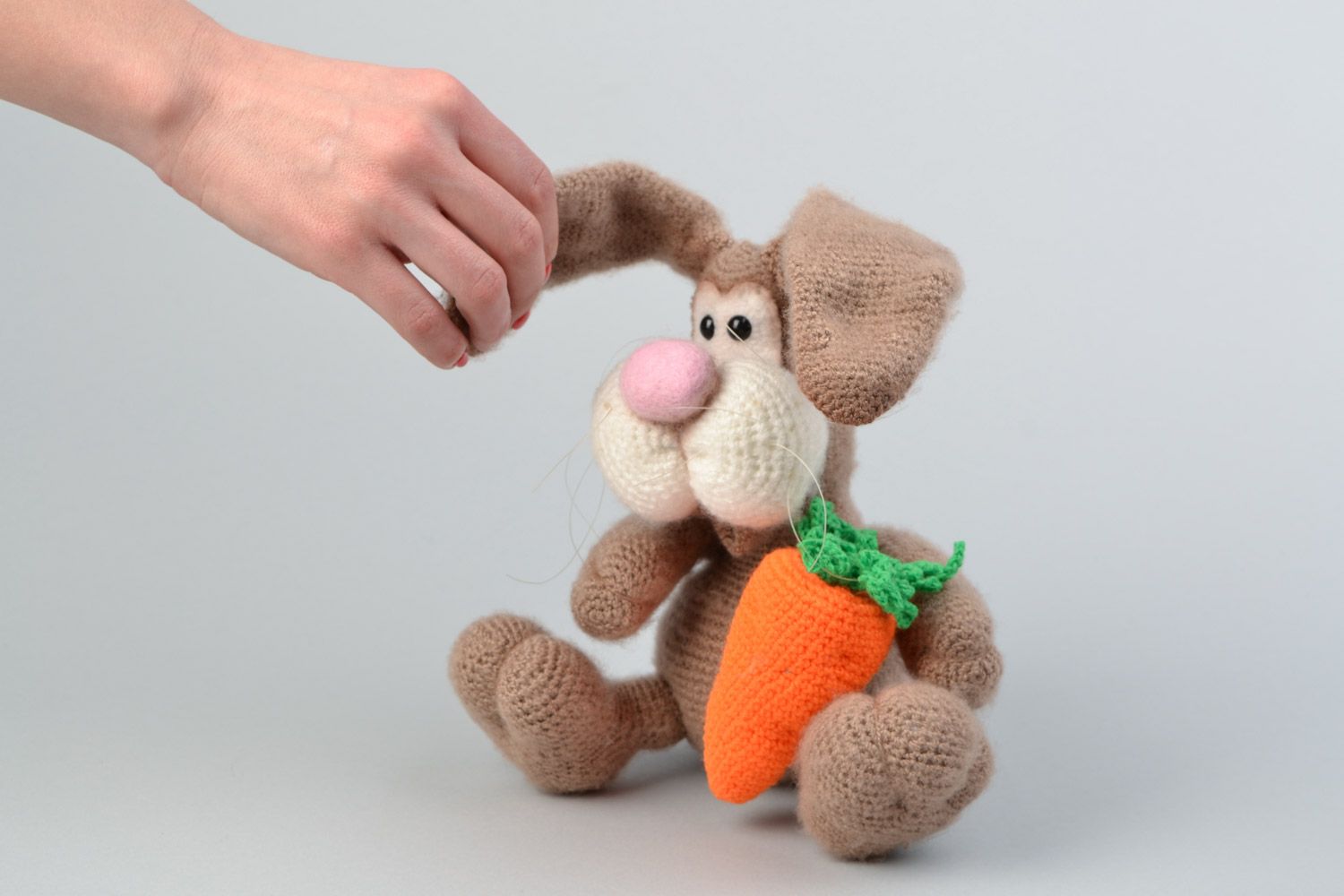 Handmade crocheted soft toy made of mohair and acrylic threads bunny with carrot photo 2