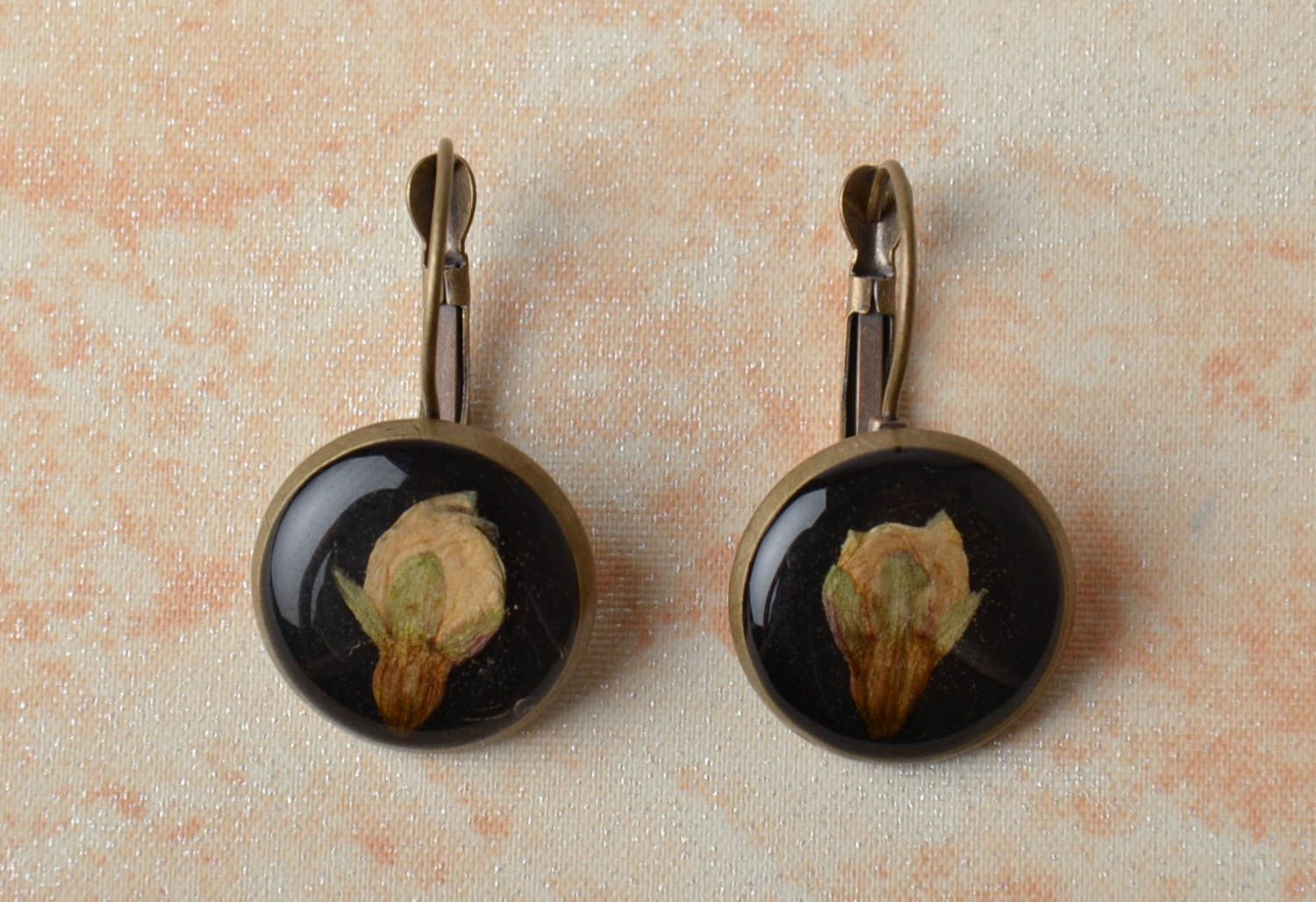 Elegant earrings with natural flowers embedded in epoxy resin photo 1