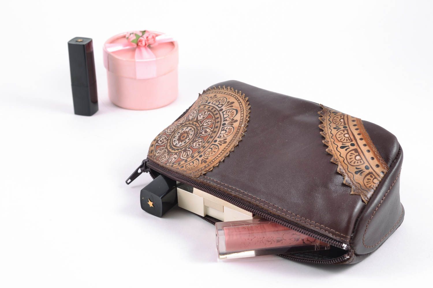 Handmade leather cosmetic bag of brown color photo 1