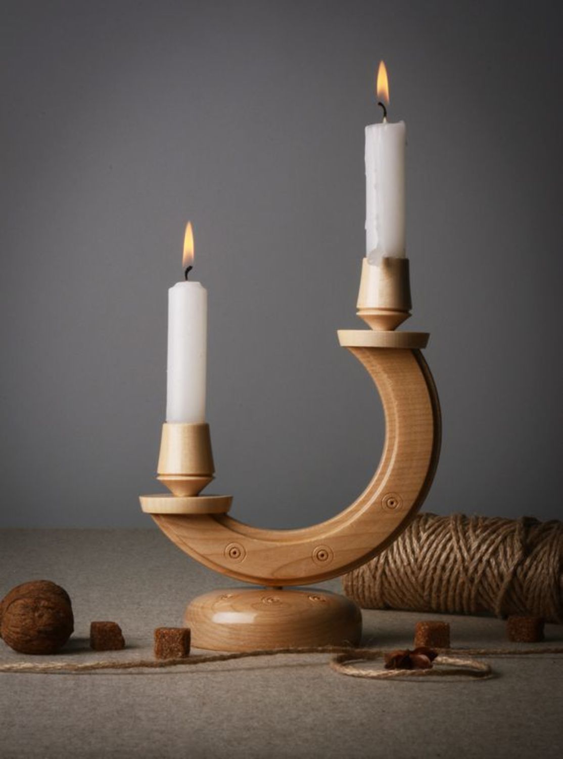 Wooden candlestick in the shape of half-moon photo 1