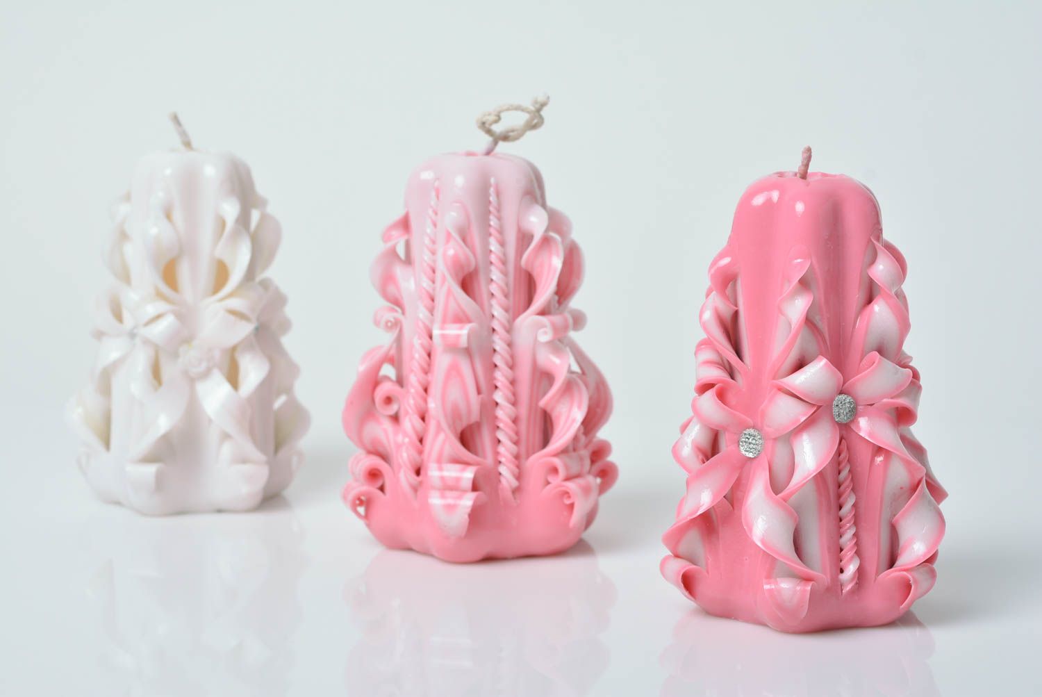 Beautiful pink handmade carved paraffin candle with decorative elements photo 5