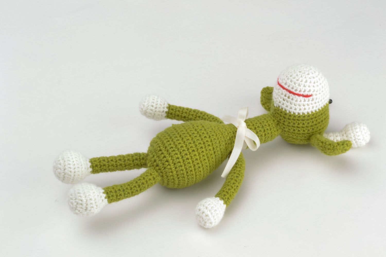 Brinquedo tricotado com gancho Girafa verde foto 4