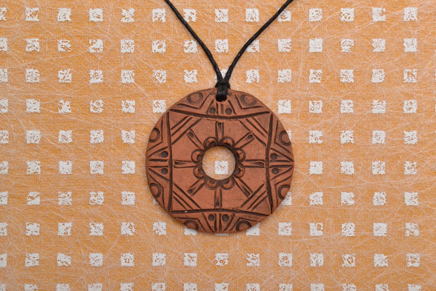 Clay pendant in ethnic style with cord photo 1