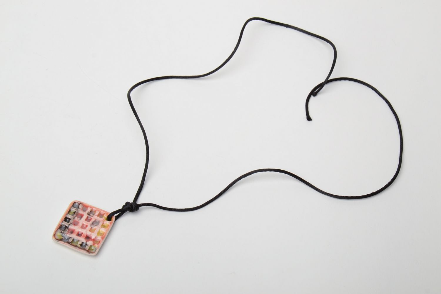 Ceramic pendant of rhombus shape with waxed cord photo 3