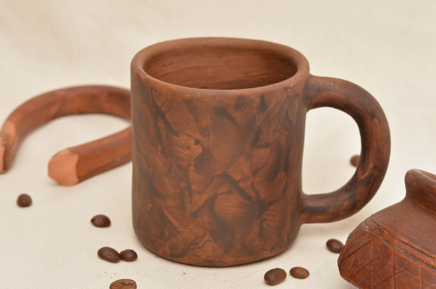 Red clay nonglazed natural handmade coffee mug with handle and no pattern photo 1