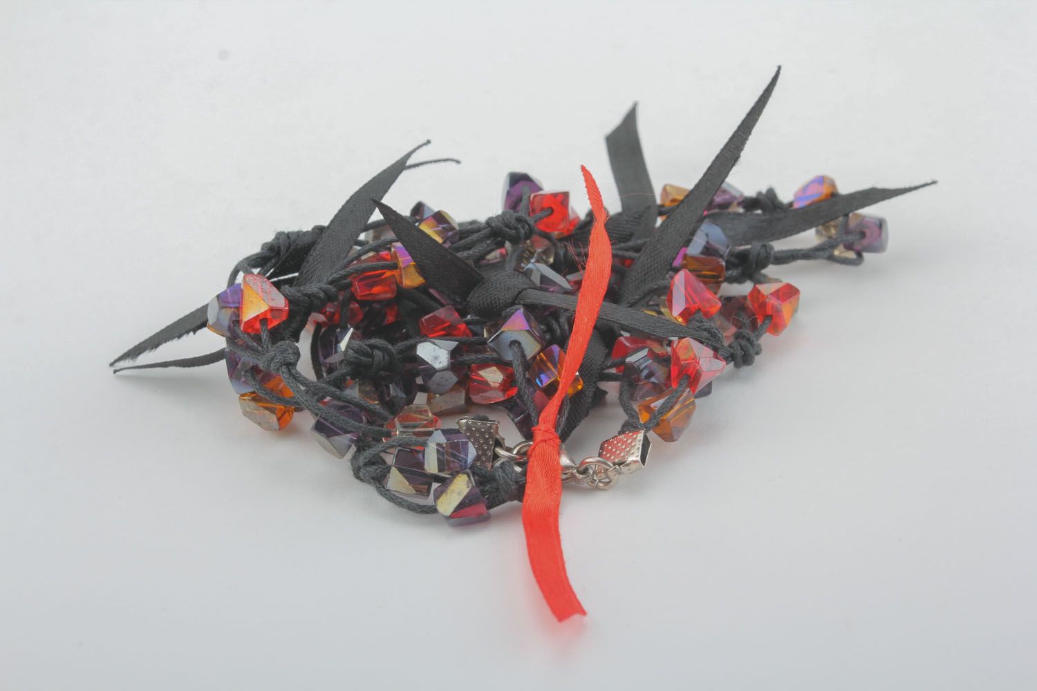 Necklace made of beads and cord photo 1